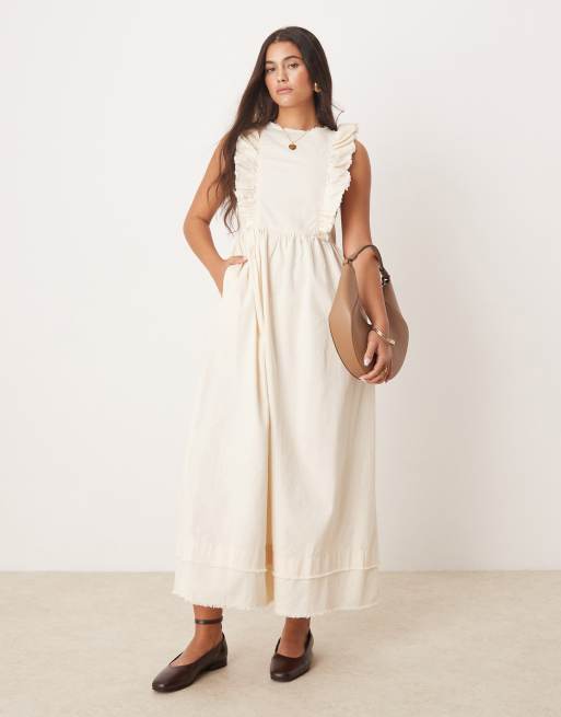 ASOS DESIGN – Maślana sukienka midi z zabudowanym dekoltem i falbankami na ramionach z diagonalu