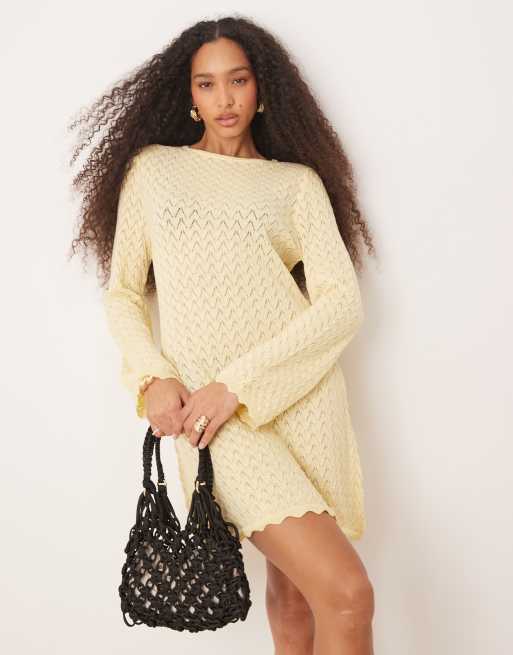 ASOS DESIGN – Maślanożółta dzianinowa sukienka mini z rozkloszowanymi rękawami