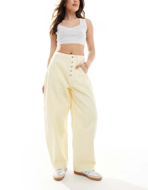 ASOS DESIGN – Maślanożółte jeansy z baryłkowymi nogawkami z rozporkiem na guziki