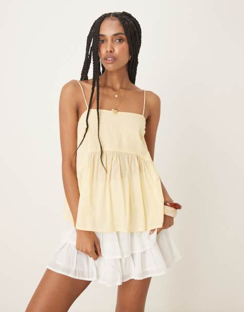 ASOS DESIGN cami with volume peplum and tie straps in buttermilk