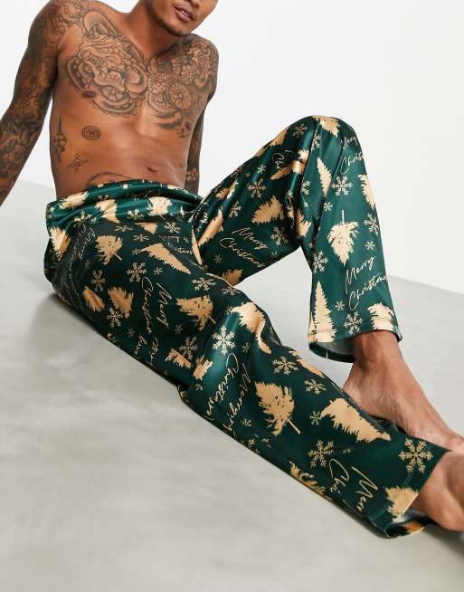 ASOS DESIGN matching Christmas satin lounge bottoms with tree print