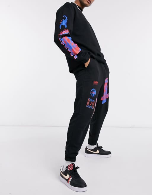 ASOS DESIGN matching oversized sweatpants with multi placement print in black | ASOS