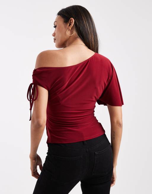 ASOS DESIGN Maternity asymmetric shoulder ruched slinky top in burgundy