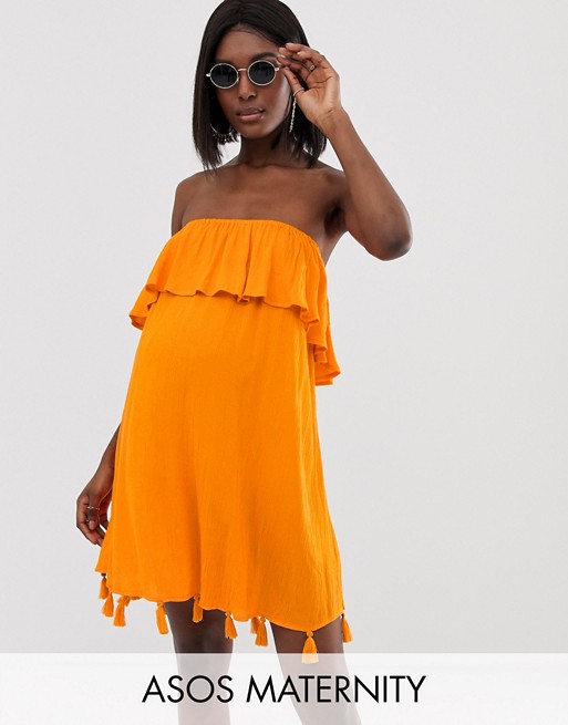 ASOS DESIGN Maternity bandeau beach dress with ruffle & tassel hem in orange
