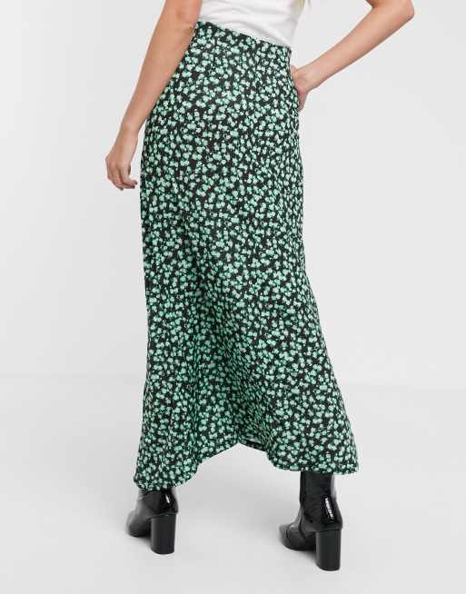 Floral dip 2025 hem maxi skirt