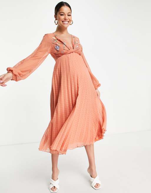 ASOS DESIGN Maternity dobby twist front pleated midi dress with all over  embroidery in rust