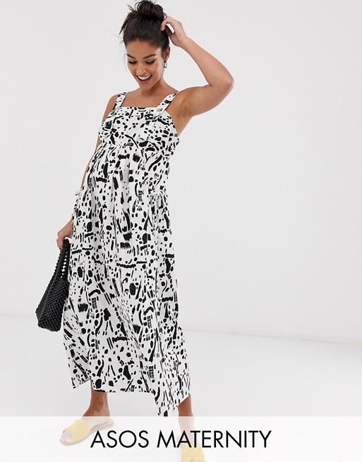 ASOS DESIGN Maternity dungaree midi sundress with pocket detail in squiggle print