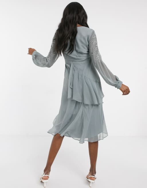 ASOS DESIGN Maternity embellished wrap waist midi dress with double layer  skirt and long sleeve in dusty blue | ASOS