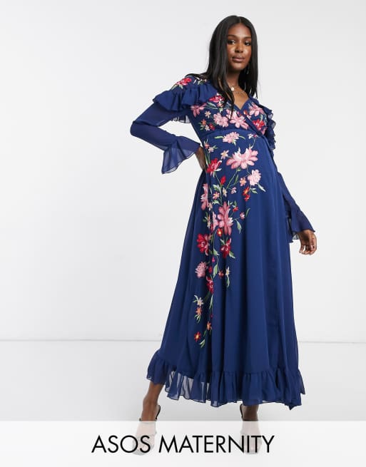 ASOS DESIGN Maternity embroidered wrap maxi dress with pephem and fluted sleeves in navy ASOS