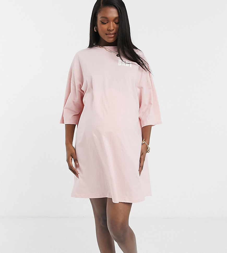 ASOS DESIGN Maternity exclusive oversized t-shirt dress in pink with baby slogan