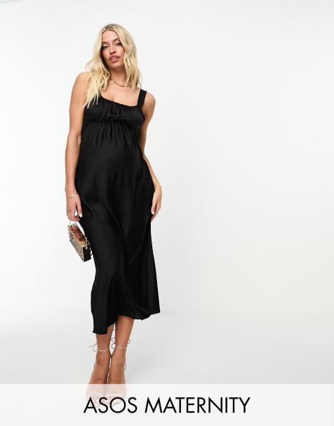 Black wrap over high-low maternity dress with short sleeves