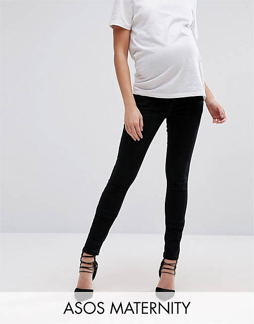 ASOS DESIGN Maternity high rise ridley 'skinny' jeans in clean black with over the bump waistband