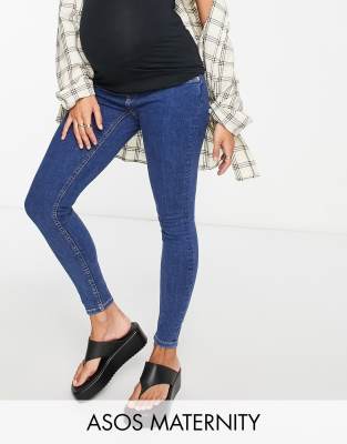 ASOS MATERNITY ASOS DESIGN MATERNITY HIGH RISE SKINNY JEANS IN MID BLUE WITH UNDER THE BUMP WAISTBAND-BLUES,SS21RIDLEYMATBLUB