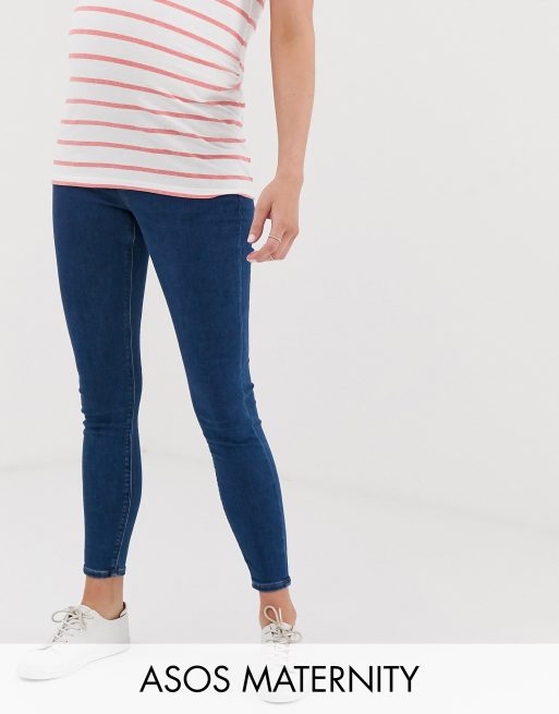 ASOS DESIGN Maternity high rise ridley skinny jeans in rich mid blue wash with under the bump waistband