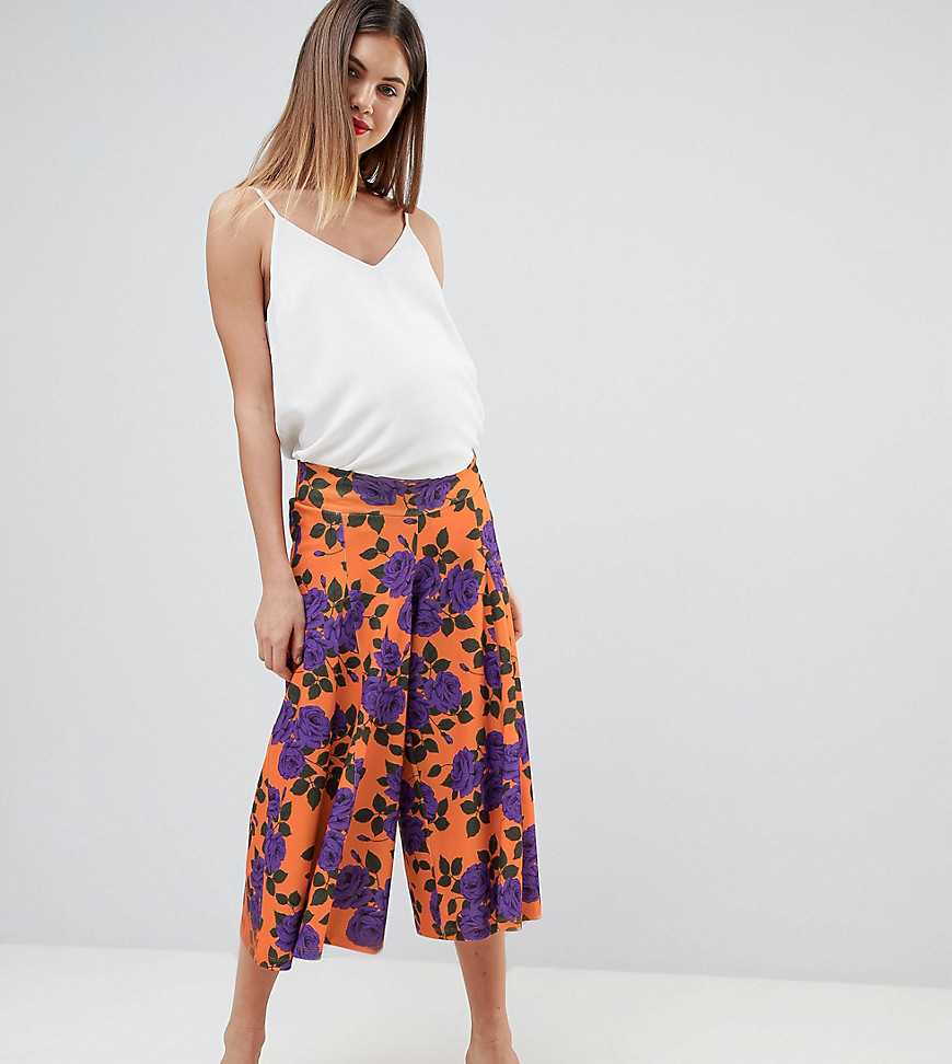 ASOS DESIGN Maternity low rise bump band wide leg culottes with flowing hem in orange floral print-Black