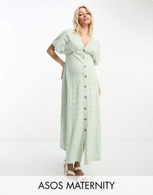 ASOS DESIGN Maternity - Midi jurk met broderie, V-hals en knopen in saliegroen met crèmekleurig contrast