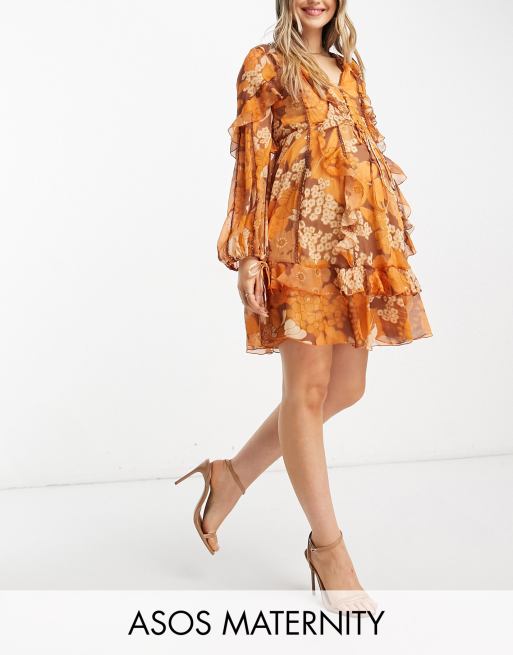 ASOS DESIGN Maternity - Mini jurk met ruches, knopen aan de voorkant en kanten detail in mosterdgeel met bloemenprint
