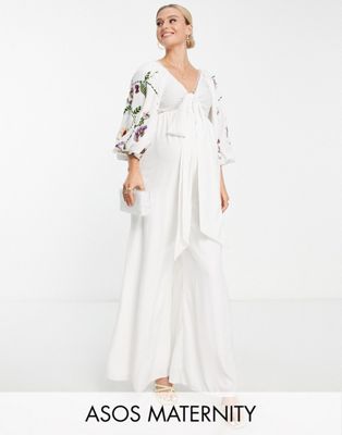 ASOS DESIGN Maternity occasion big sleeve tie front wide leg jumpsuit with embroidery - ASOS Price Checker
