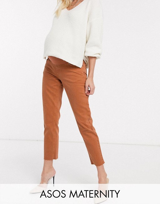 ASOS DESIGN Maternity original mom jean in rust with raw hem detail and under the bump band