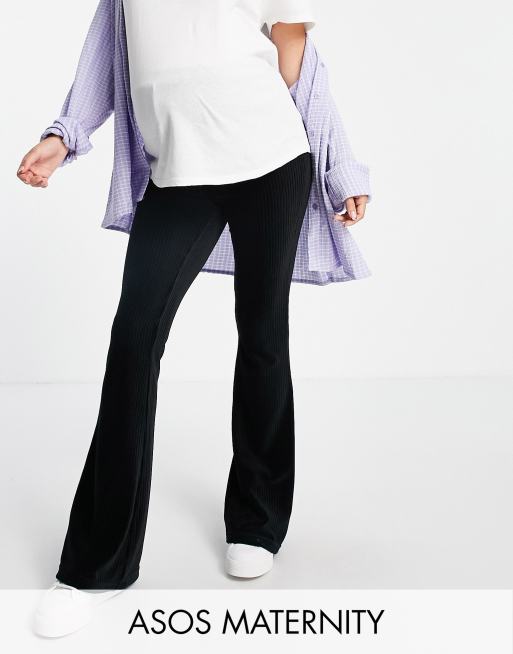 ASOS DESIGN Maternity - Pantaloni a zampa con fascia sul pancione in velluto a coste nero