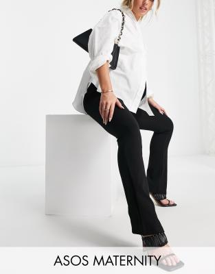 ASOS DESIGN Maternity - Pantaloni da abito slim neri in jersey con fascia sopra il pancione 