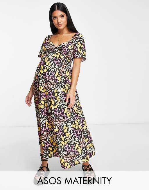 ASOS DESIGN Maternity pleated knot detail midi dress in black base floral