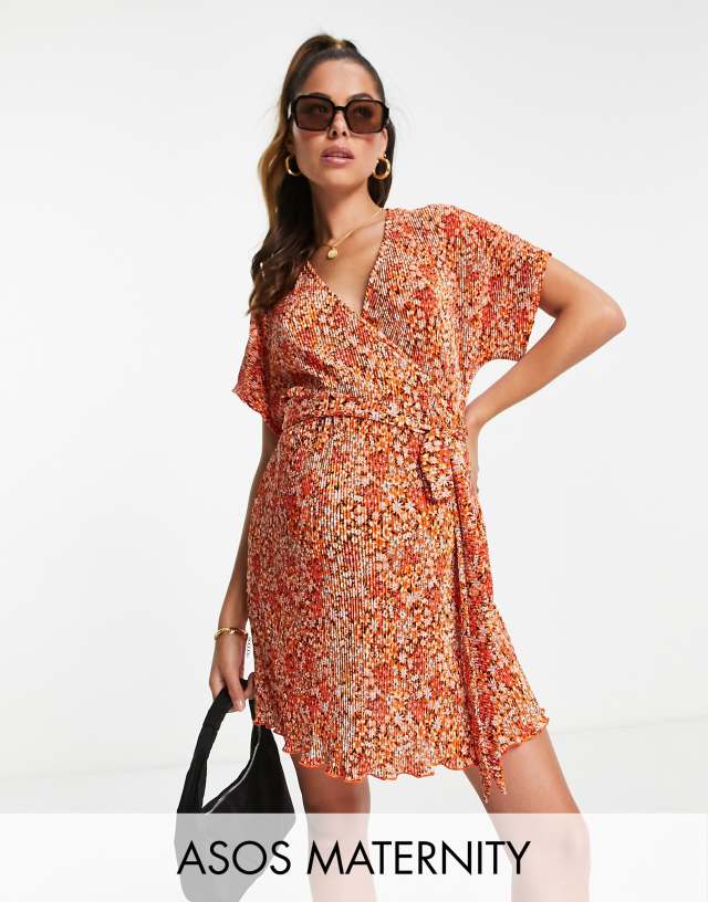 ASOS DESIGN Maternity plisse wrap dress with short sleeves in orange ditsy floral