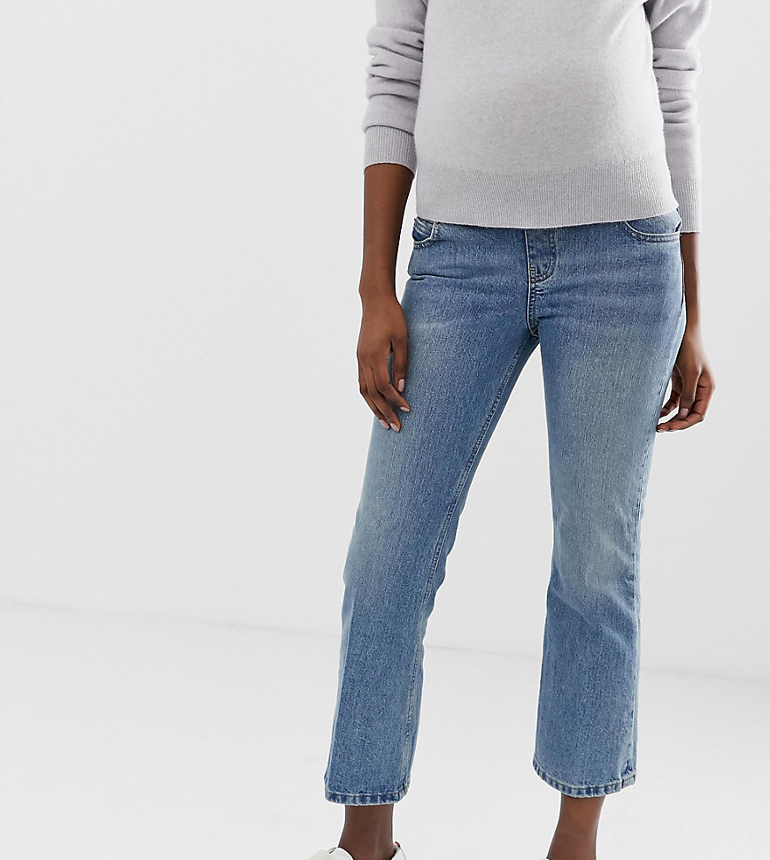 ASOS DESIGN Maternity Recycled Egerton rigid cropped flare jeans in mid stonewash blue with under the bump waistband