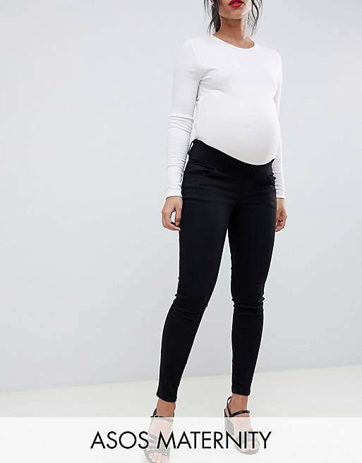 ASOS DESIGN Maternity – Ridley – Hochgeschnittene Skinny-Jeans in reinem Schwarz mit Unterbauchbund