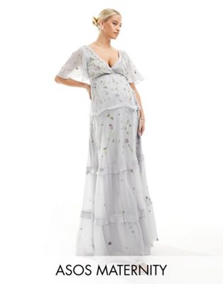 ASOS DESIGN Maternity Bridesmaid flutter sleeve embellished wrap maxi dress with embroidery in light blue - ASOS Price Checker