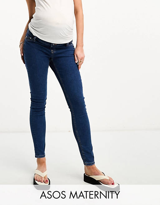 ASOS DESIGN Maternity - Skinny jeans met over de buik vallende tailleband in middenblauw 