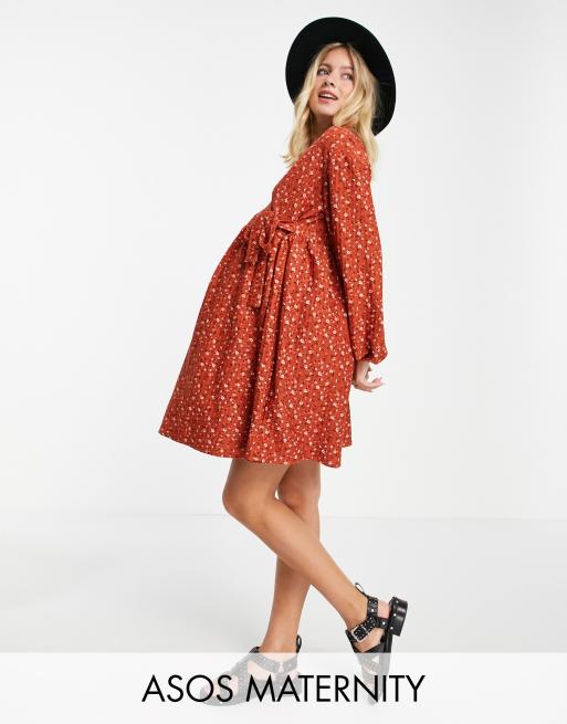 ASOS DESIGN Maternity smock oversized mini wrap dress in rust whimsy floral