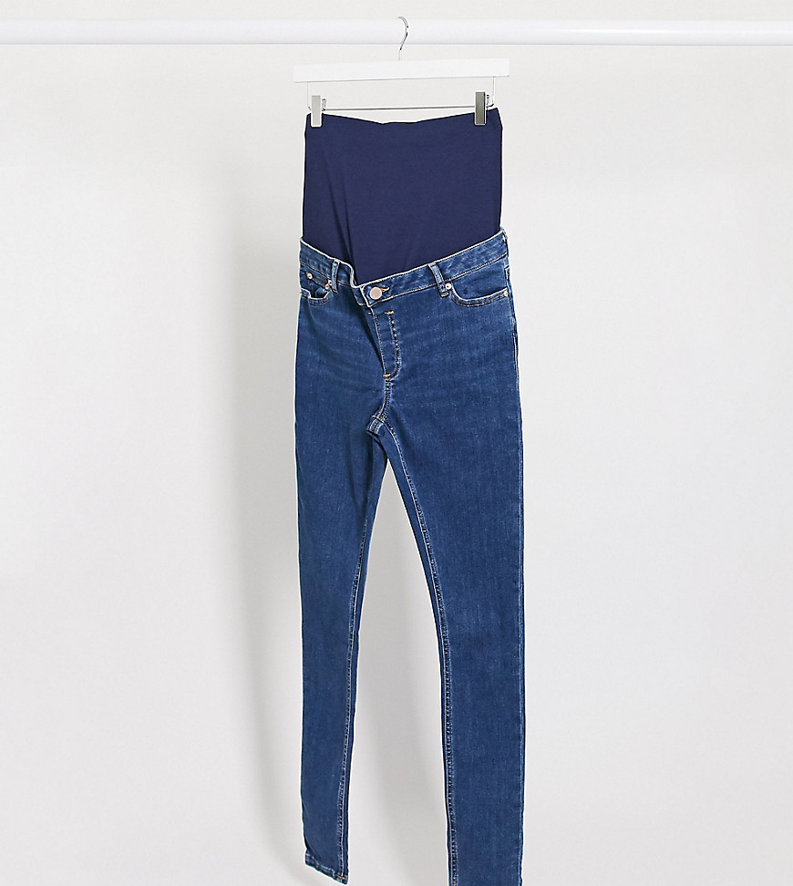 ASOS DESIGN Maternity Tall Ridley high waist skinny jeans in bright midwash blue with over bump waistband