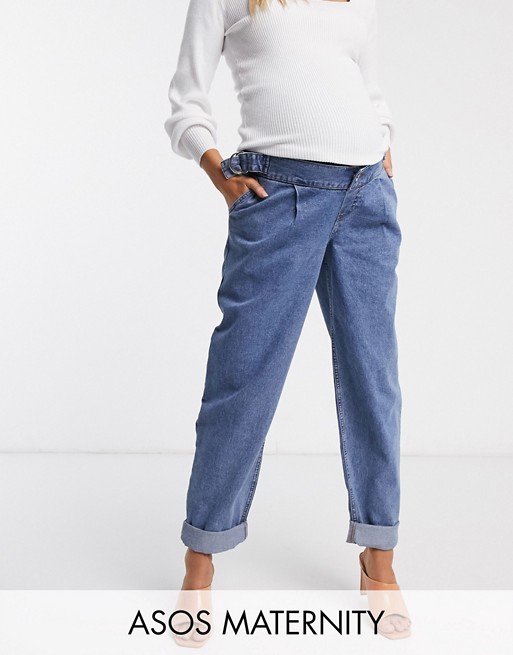 ASOS DESIGN Maternity tapered boyfriend jeans with d-ring waist detail with curved seams in blue with over the bump bump