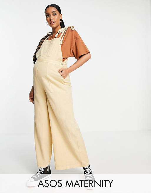 ASOS DESIGN Maternity textured tie shoulder dungaree in washed stone