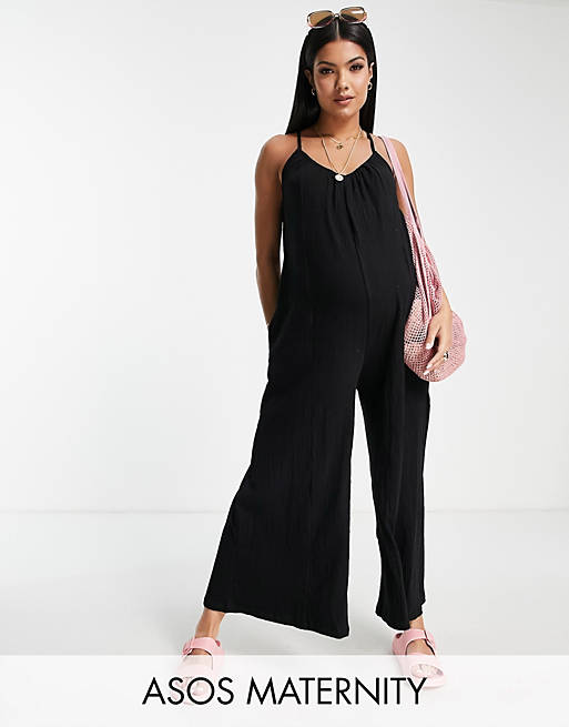 ASOS DESIGN Maternity - Tuta jumpsuit minimal con fondo ampio e spalline sottili nera stropicciata 