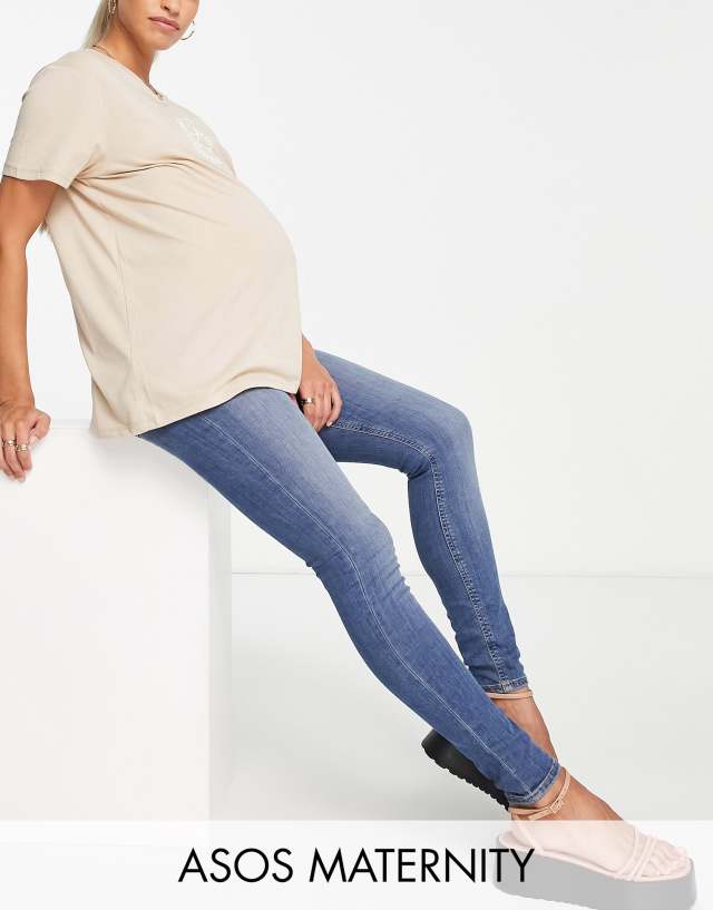 ASOS Maternity - ASOS DESIGN Maternity ultimate skinny jeans in authentic mid blue with under the bump waistband