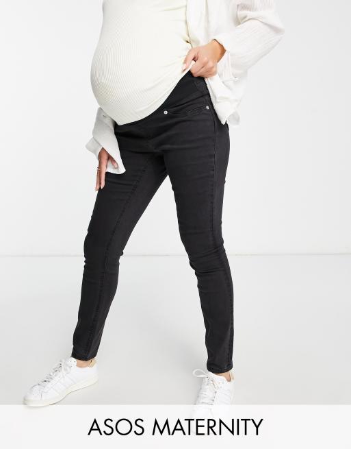 ASOS DESIGN Maternity ultimate skinny jeans in washed black with under ...