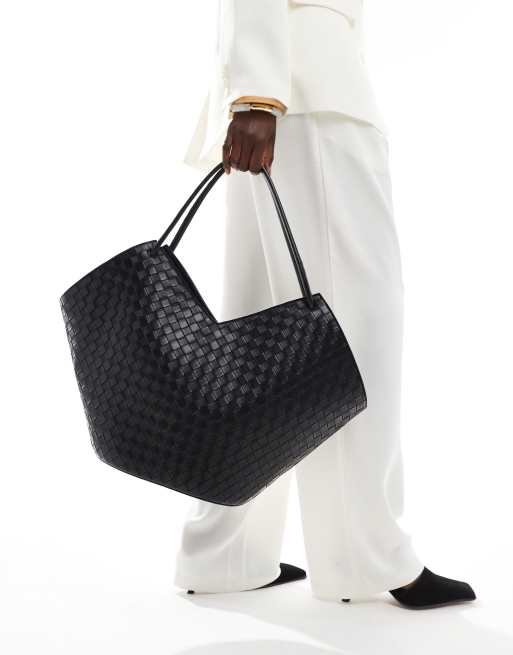 ASOS DESIGN - Maxi borsa nera intrecciata con dettagli tubolari