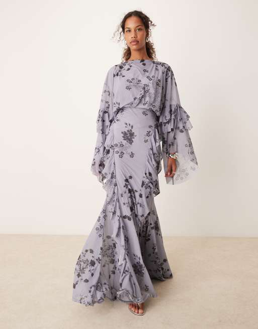 ASOS DESIGN maxi dress with oversized ruffle detail sleeves and waterfall ruffle skirt in blue floral print