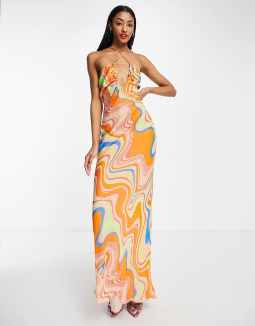 ASOS DESIGN - Maxi jurk met gekruiste bandjes aan de voorkant en all-over wervelprint in oranje
