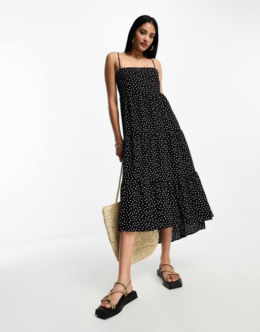 ASOS DESIGN - Maxi-jurk met open achterkant, stroken, ongelijke zoom en stippen in zwart-wit