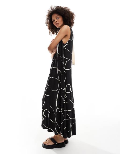 ASOS DESIGN - Maxi-jurk zonder mouwen met A-lijn en ring op de rug in zwart met print