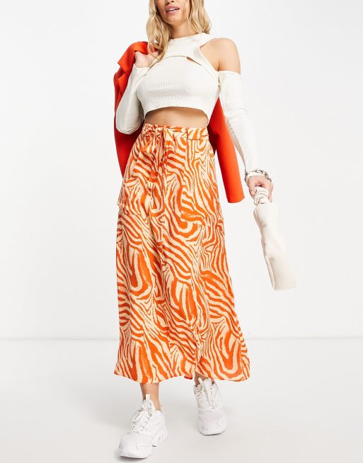 ASOS DESIGN – Maxi-Wickelrock mit Taschen und Zebramuster in Orange