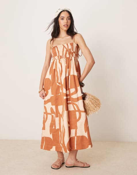 ASOS DESIGN – Maxikleid aus Baumwoll-Satin mit gesmoktem Dekolleté und abstraktem Muster - view 1