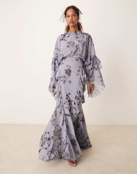 ASOS DESIGN – Maxikleid in Blau mit Blümchenmuster, Oversize-Rüschenärmeln und Wasserfallrüschen-Rockteil - view 1