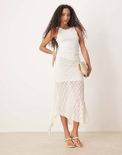 ASOS DESIGN – Maxirock aus transparenter, strukturierter Spitze in Elfenbeinweiß mit gespleißtem Design - view 1