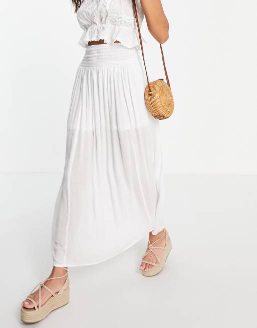 ASOS DESIGN – Maxirock in Knitteroptik mit gerafftem Einsatz, in Weiß, 2 von 4