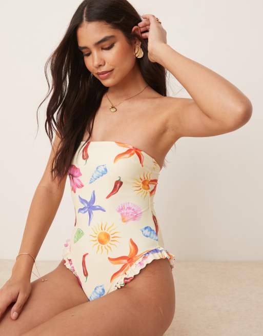 ASOS DESIGN May frill edge bandeau swimsuit in shell print