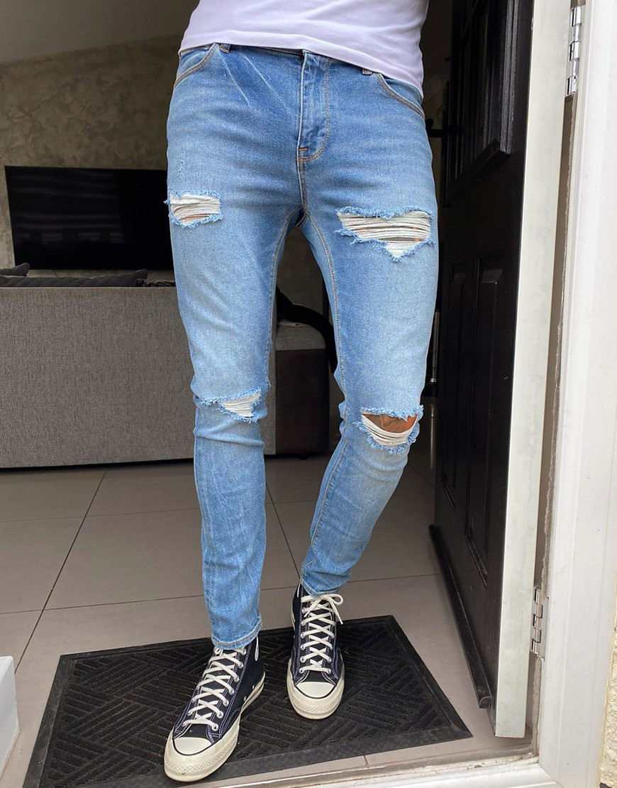 ASOS DESIGN - Medium-forvaskede blå super skinny-jeans med mellemstore flænger